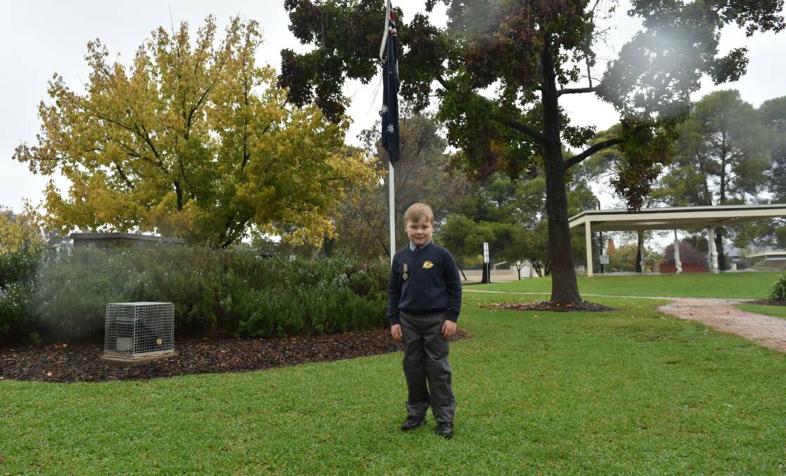 ANZAC DAY 2017: Fergus Meyer, 5, prepares to attend the Anzac Day service at Henty. Picture: Lorri Roden 
