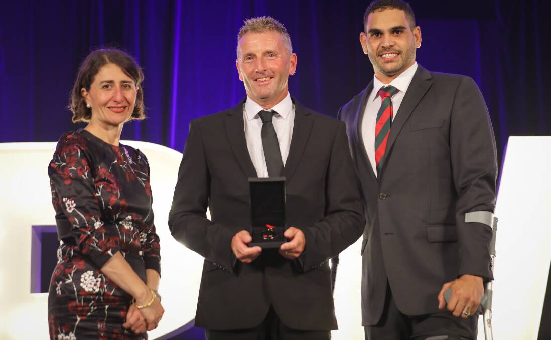 AWARD WINNER: Robbie Mackinlay with Premier Gladys Berejiklian and NRL star Greg Inglis