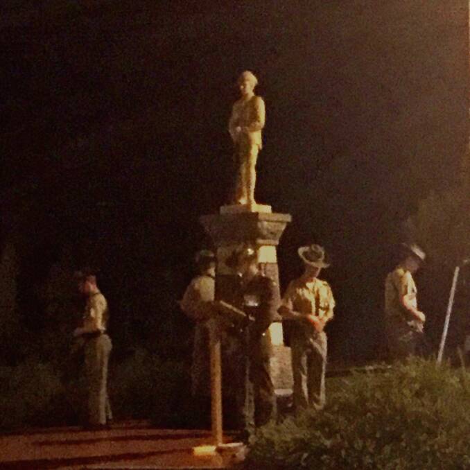 Soldiers at the cenotaph at the dawn service at The Rock in the Riverina.