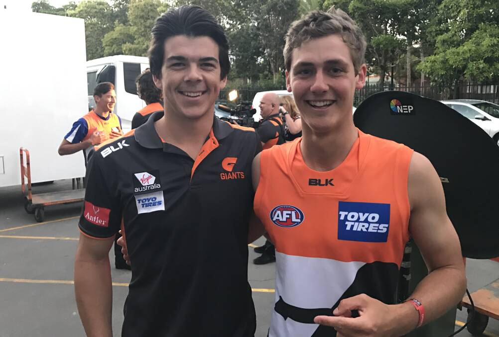 WE:COME ABOARD: Harry Perryman (right) is welcomed to Greater Western Sydney (GWS) by former Collingullie teammate Matt Kennedy at Friday night's AFL Draft in Sydney. Picture: GWS Giants