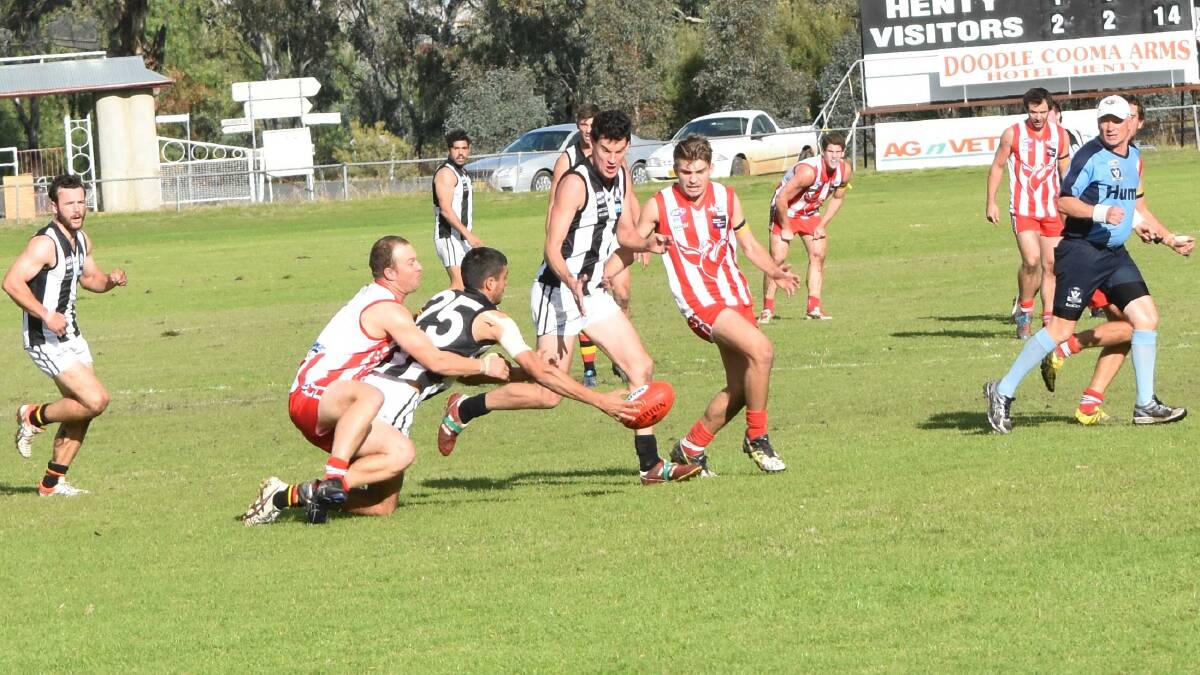 TUSSLE: Ben Clements, Murray Magpies, and Sam Terlich, Henty. Picture: Lorri Roden