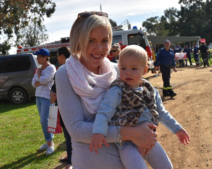 FAMILY: Kristel and Alice White at the Henty Fire Station open day at the weekend. Send your event details to rivcontributors@fairfaxmedia.com.au. Picture: Lorri Roden