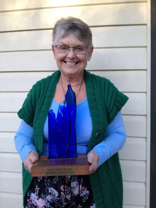 TALENT: Susan Creek, from Pleasant Hills CWA branch, with the Most Creative Trophy for entries at Riverina Group Handicraft Day. Picture: Contributed
