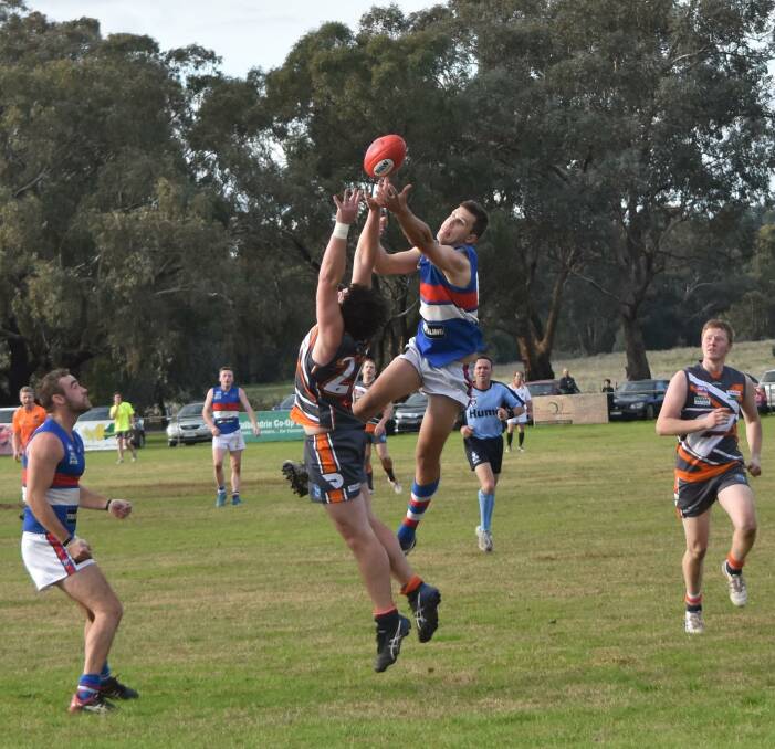 GO AHEAD JUMP: Mick Hamilton, Rand-Walbundrie-Walla, takes on Jindera's Lewis Childs at Walbundrie at the weekend. Picture: Lorri Roden