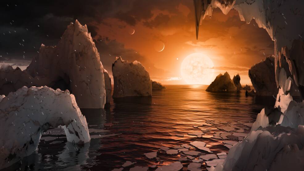 This illustration shows the possible surface of TRAPPIST-1f, one of the newly discovered planets in the TRAPPIST-1 system. Scientists using the Spitzer Space Telescope and ground-based telescopes have discovered that there are seven Earth-size planets in the system. Picture: NASA/JPL-Caltech
