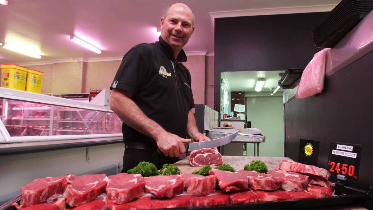 CUT PRICE: Wagga butcher Ray Farrell says customers are saving big by shopping around and looking at the 'per kilo' price for their meat. Picture: Les Smith.