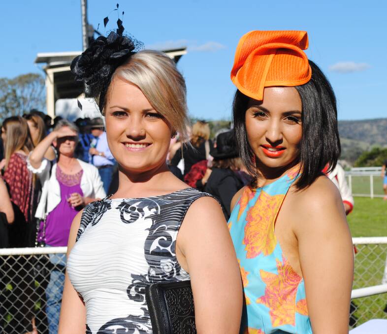 Young Miss Racegoer winner Zahra Elsenussi (left) with runner-up Kat Thompson.
