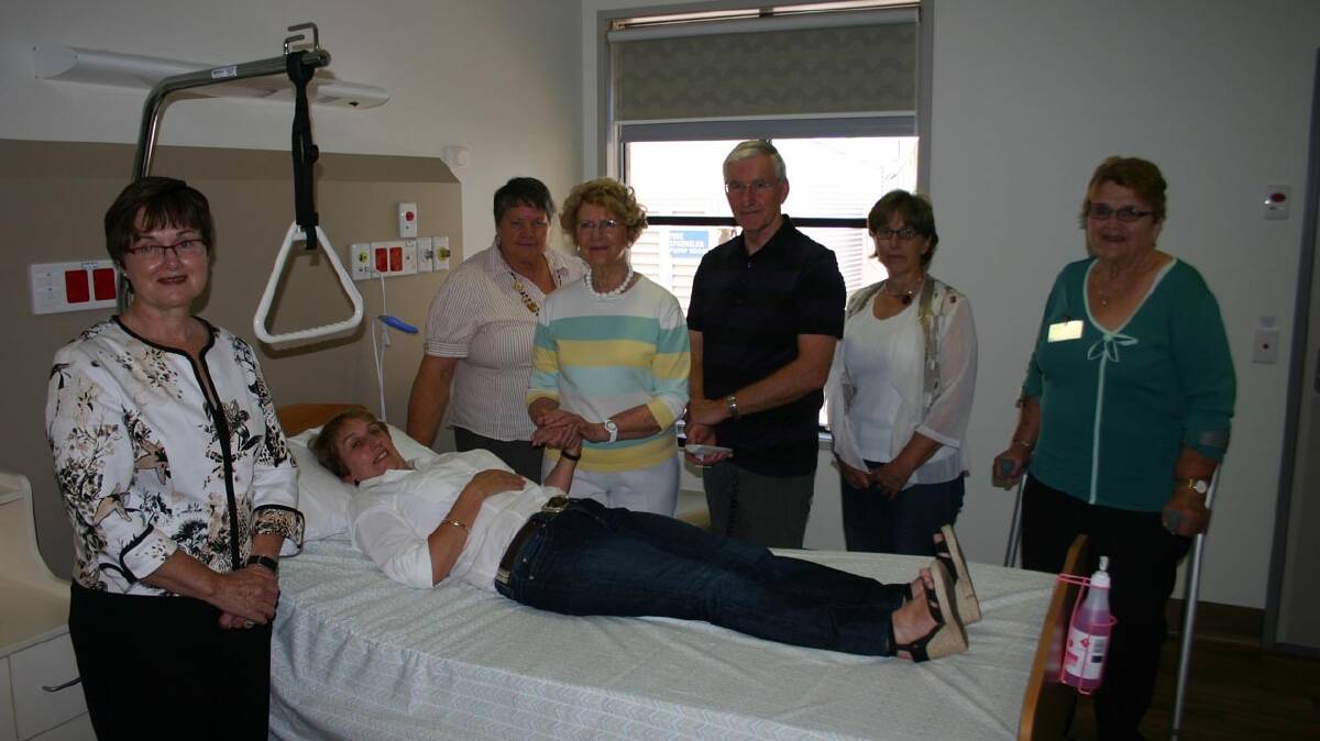 Lockhart Local Health Advisory Committee member Fran Day, LHAC chair Lorraine Hoffman, LHAC member Myra Jenkins, Lockhart GP Dr Ken Mackey, Murrumbidgee Local Health District chief executive Susan Weisser, Lockhart LHAC members Fran Day, Rose Lehmann and (front) MLHD rural group manager – MIA Michelle Sleep in one of the Lockhart Hospital’s redeveloped rooms.