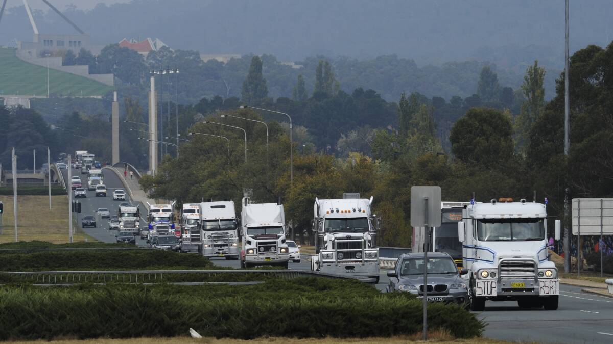Truck convoy in Canberra supporting the government's scrapping of the union-backed Road Safety Remuneration Tribunal.