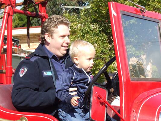 NSW Firefighter MathewDavidson with his son Oliver.