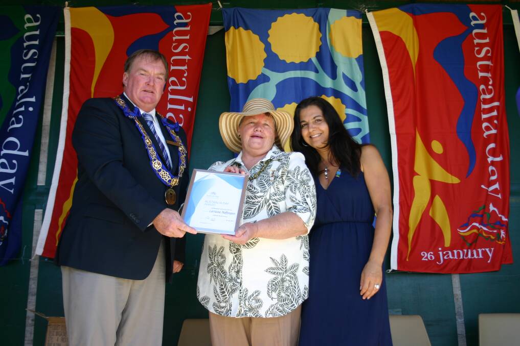 Lorraine Hoffmann receives her Australia Day Award from mayor Peter Yates and Liz Deep-Jones.