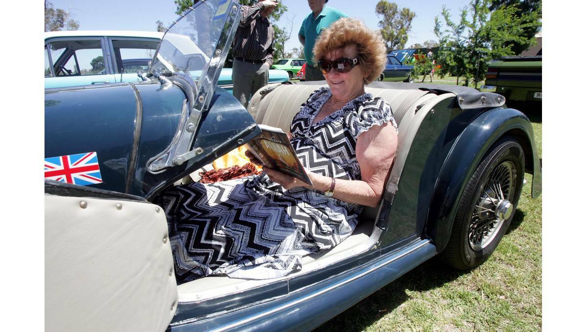 Leeton Vintage and Veteran Car Club show and shine: Mavis Shepard from the Cootamundra Antique Car Club brought a long a book to read while sitting in her 1969 Morgan. Picture: The Irrigator