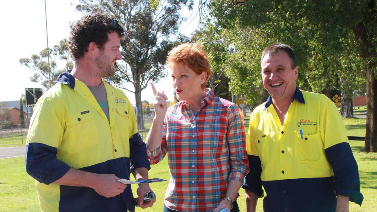 Simon Carusi and Tony Romeo catch up with Pauline Hanson during her visit to Griffith in the lead-up to the 2013 election.  Picture: The Area News