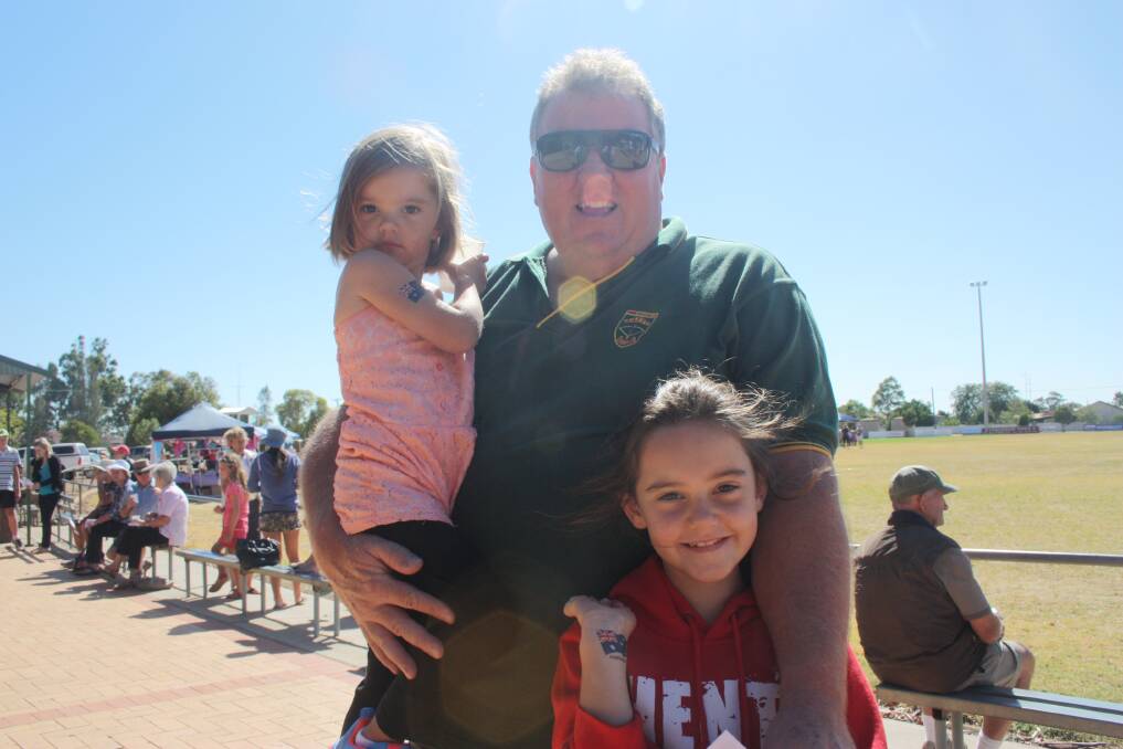Jim Quee with his grand daughters Ashton and Milly.