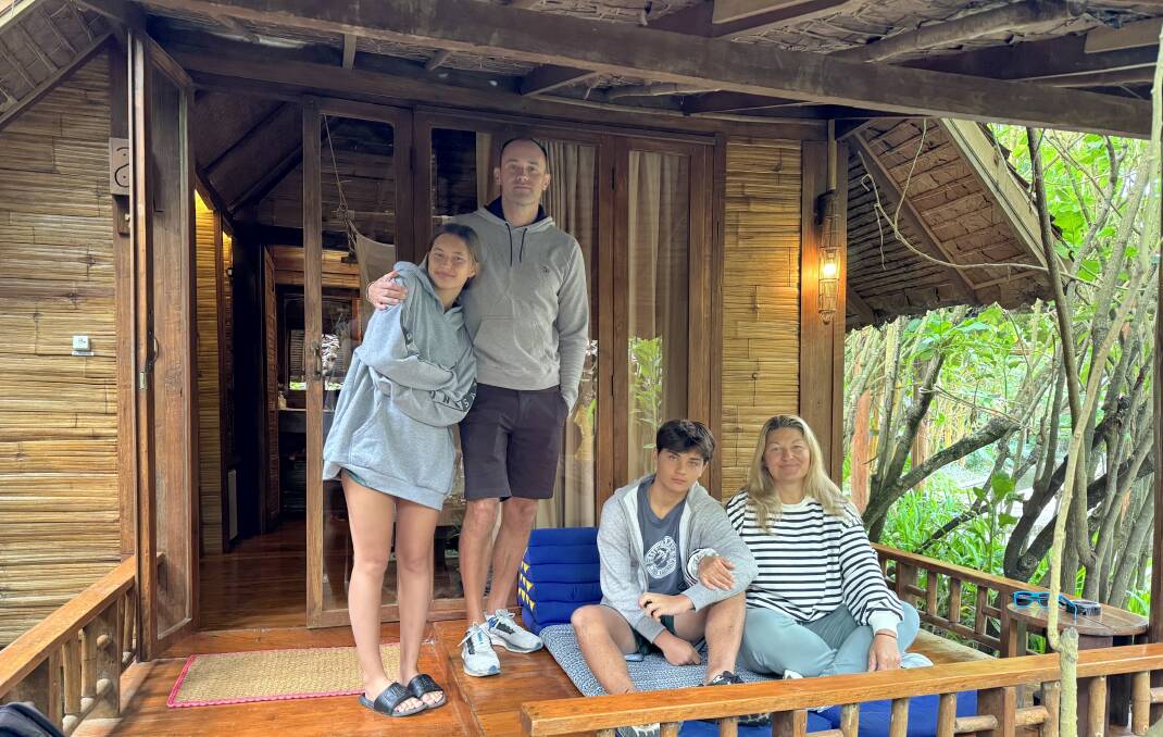 The writer and her family at their Pai accommodation.
