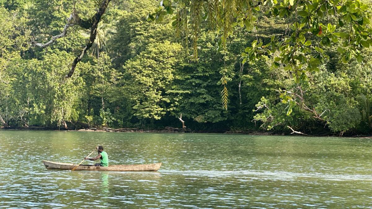 Kayaking in a dugout canoe in Solomon Islands' Western Province. Picture by Daniel Scott Kayaking in a dugout canoe in Solomon Islands' Western Province. Picture by Daniel Scott
