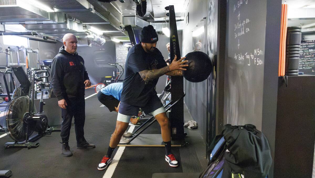 Nick Kyrgios (right) and co-owner of The Den gym, Mick Mackell. Picture by Keegan Carroll Nick Kyrgios (right) and co-owner of The Den gym, Mick Mackell. Picture by Keegan Carroll