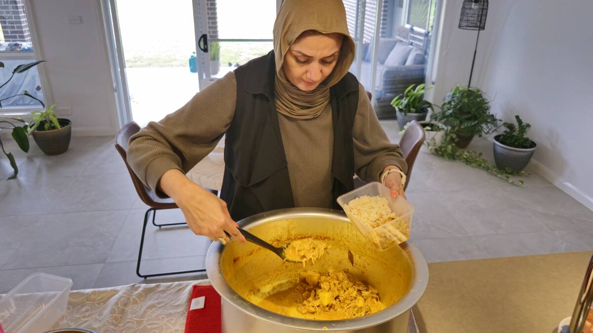 Sazma Mohammed prepares a meal for the Glen Innes community at an iftar dinner in April 2024. Picture supplied