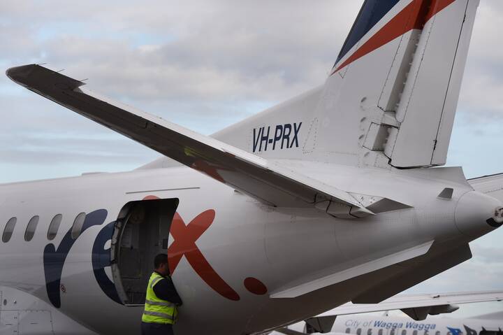 A REX Airlines plane at Sydney Airport. Picture by AAP Image/Dean Lewins A REX Airlines plane at Sydney Airport. Picture by AAP Image/Dean Lewins