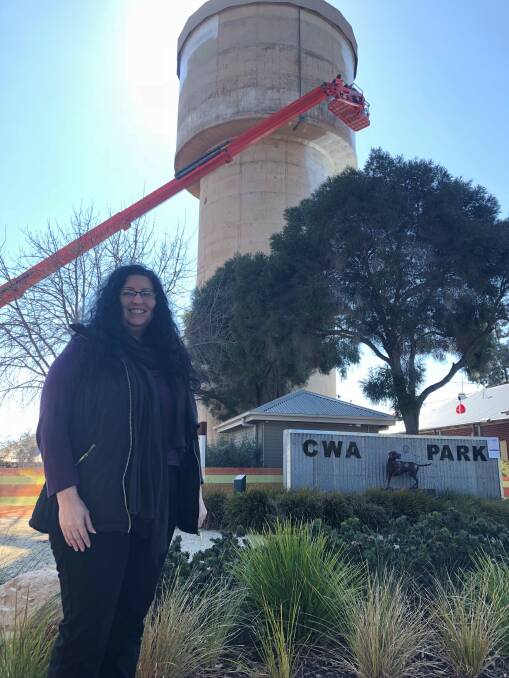 PAINT A PICTURE: Lockhart Shire tourism and economic development officer Jennifer Connor pictured with the water tower in the background. Picture: Nikki Reynolds