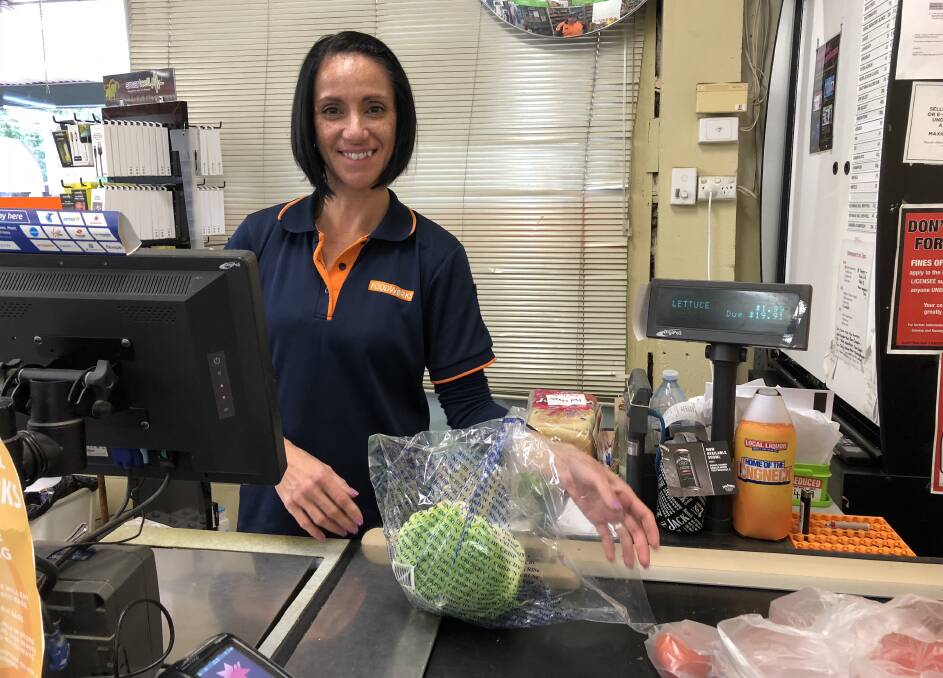 FAMILIAR FACE: Katrina Camin tackles the 4pm rush at the popular FoodWorks store at The Rock. Picture: Nikki Reynolds