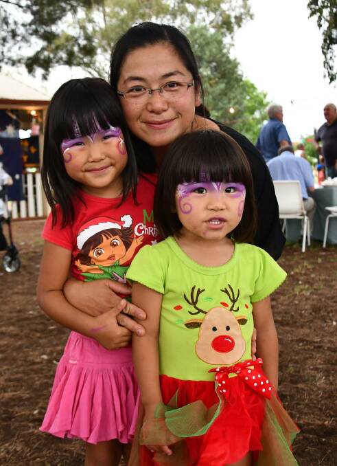 CHRISTMAS SPIRIT: Keiko Todori and daughters, Meg, 4, and Sara, 2.  