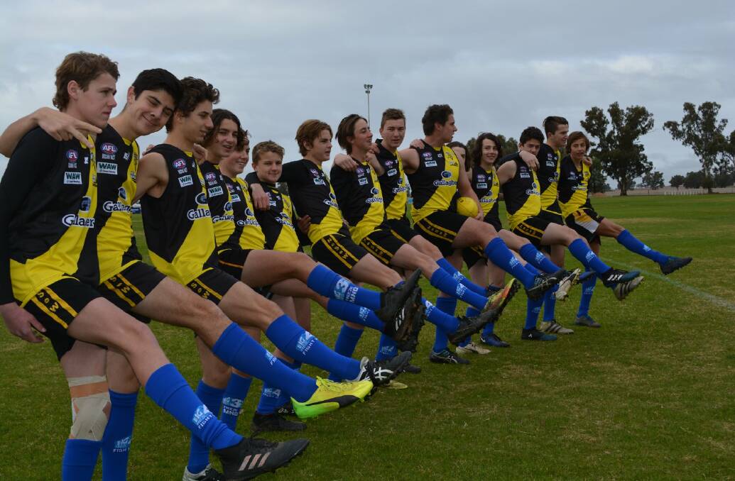 SOCK IT: Osborne players support the Sockit To MND cause during the game on Saturday. Picture: Supplied 