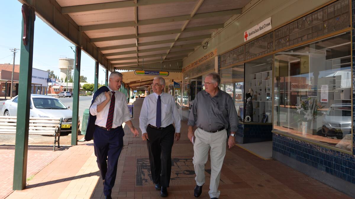 ON THE MAP: Member for Riverina Michael McCormack, Lockhart Shire Council general manager Peter Veneris and Mayor Rodger Schirmer. 