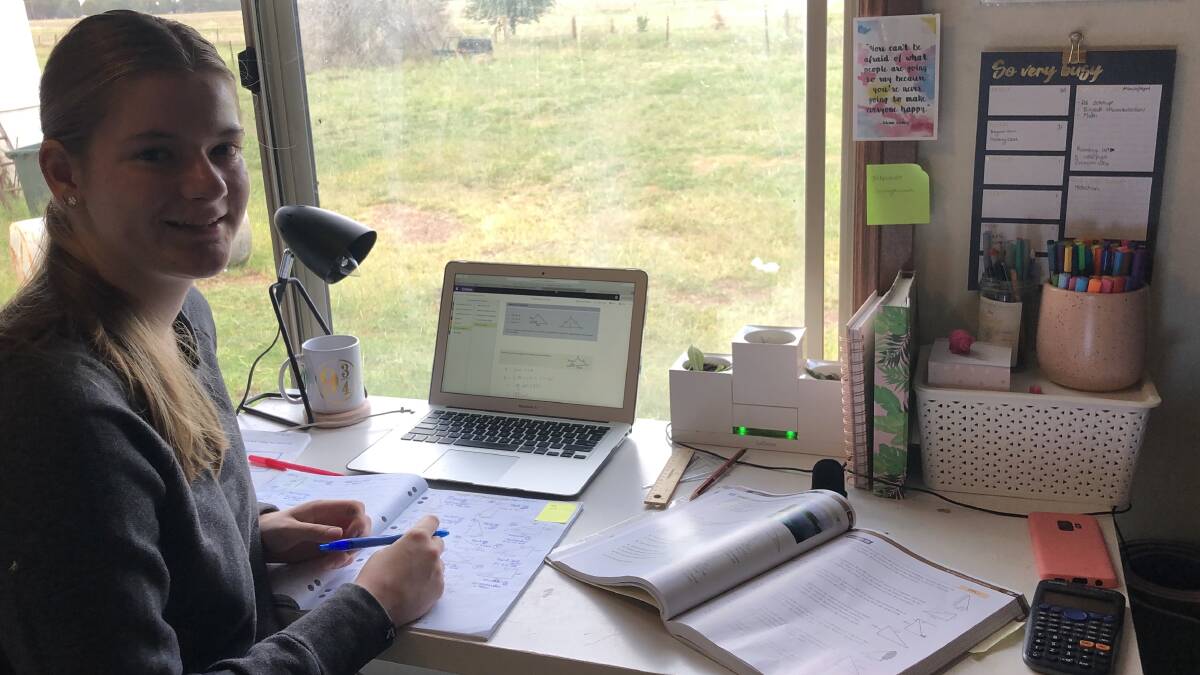 SCHOOL AT HOME: Year 12 student April Kennedy embraces studying online. Picture: Supplied 