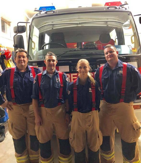 TEAMWORK: Members of Henty's NSW Fire and Rescue. 