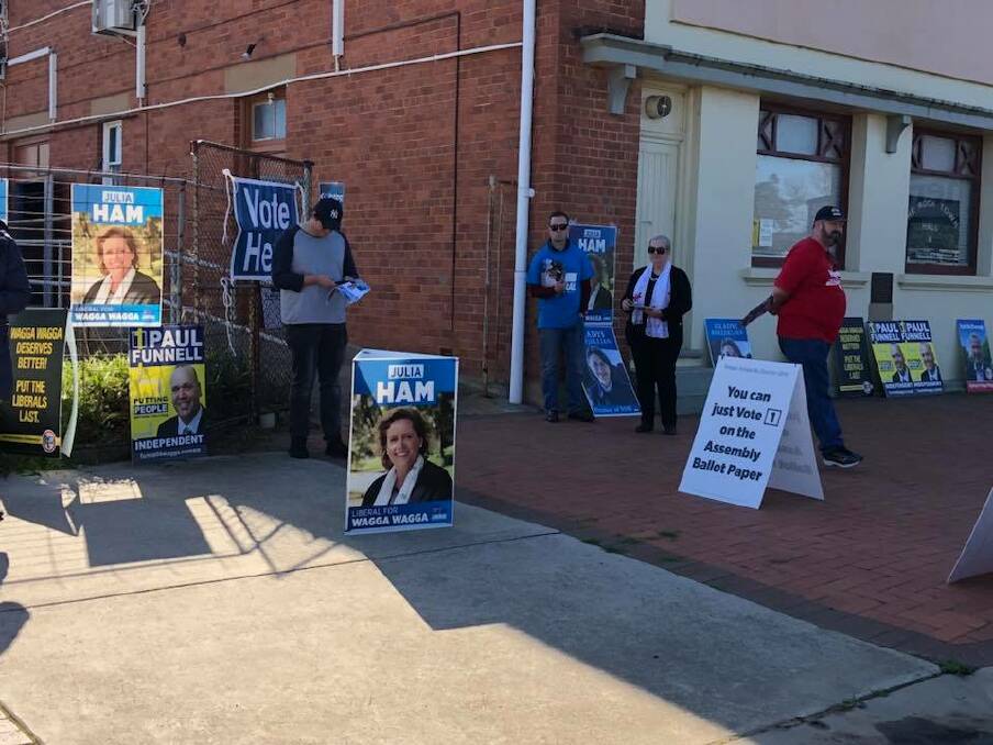 TOO CLOSE TO CALL: Action from the polling booth at The Rock during the Wagga By-Election.