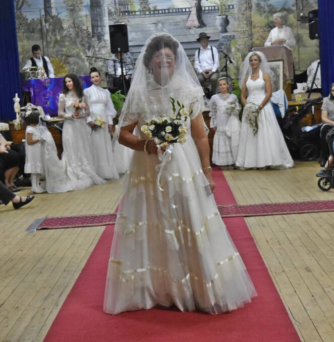 MEMORABLE: Oriel McRae, 84, modeled the gown she wore on her wedding day 60 years ago. Picture: Lorri Roden 