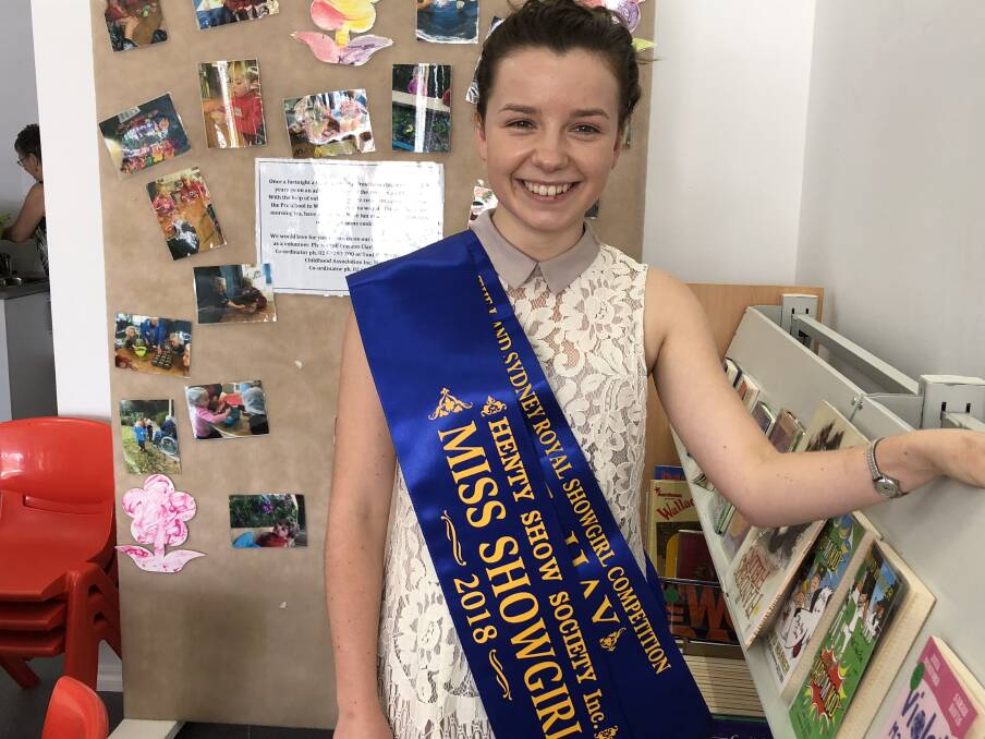 POSITIVE OUTLOOK: Emily Jones is the Henty Showgirl. She will later represent the region and zone at the Sydney Royal Easter Show in the showgirl competition. Picture: Nikki Reynolds 