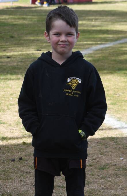 Spencer Bahr, 7, is an Osborne footy supporter as well as playing in the under 8 team. 