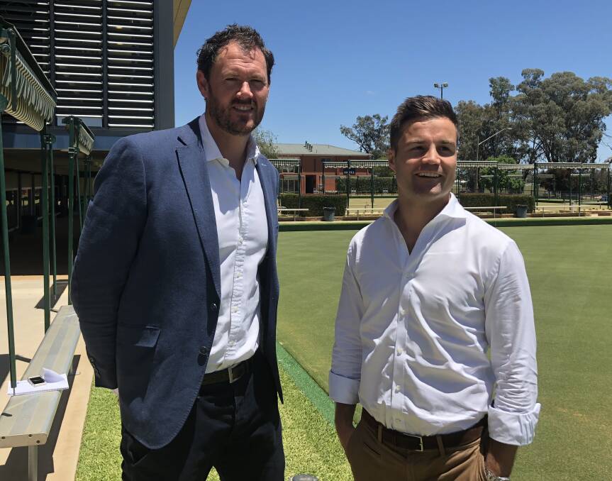 OFFICIAL VISIT: AFL NSW-ACT chief executive Sam Graham and state manager - football, policy and major projects Sam Chadwick at Wagga RSL Club on Monday. Picture: Matt Malone
