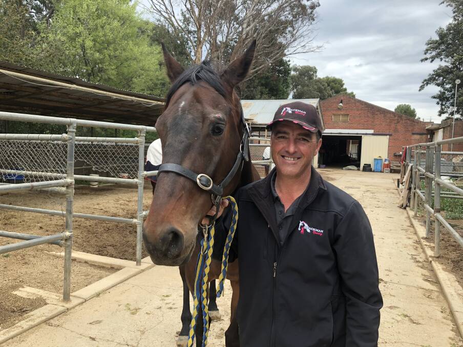 LOCKHART BOUND: Wagga trainer Scott Spackman with Cryfowl at his stables on Thursday ahead of the gelding's run in the Lockhart Verandah Town Cup (1400m) on Friday. Picture: Matt Malone