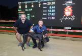 Mackenna with owner Georgio Alvaro and Kennel representative Darryl Thomas after her stunning 29.20s win in the Golden Easter Egg heats. Picture supplied