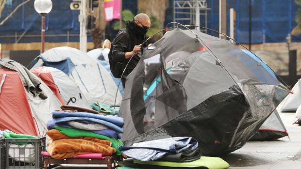 The residents of Martin Place's tent city prepare to move on. Photo: Daniel Munoz
