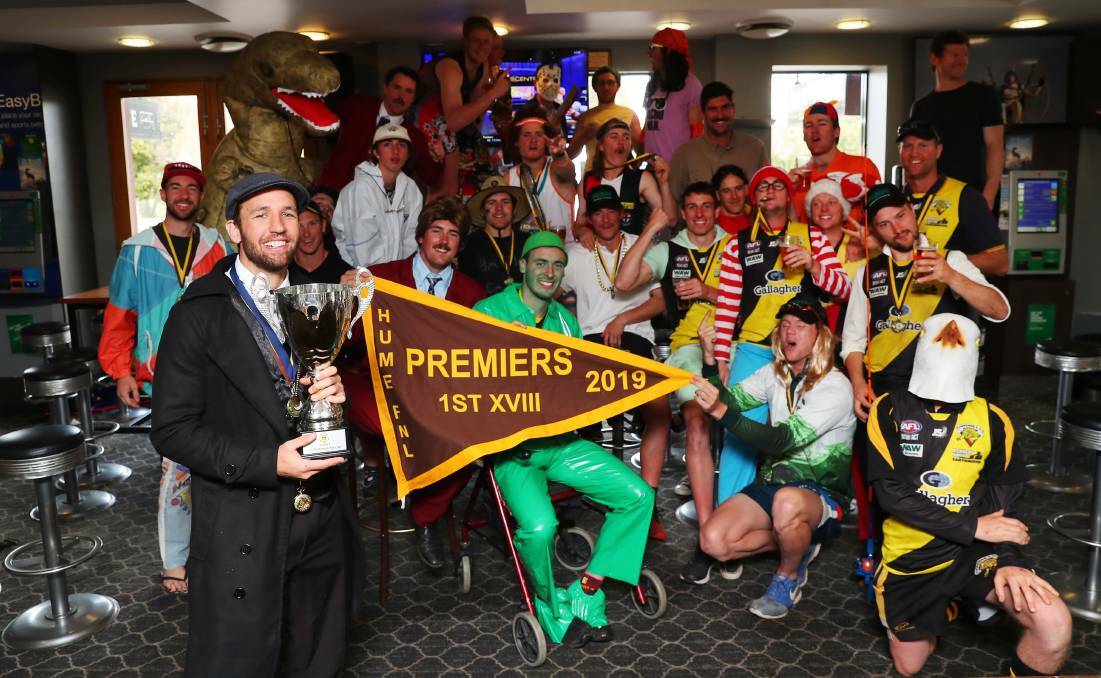 NOT THIS YEAR: Osborne celebrate last year's premiership flag at the William Farrer Hotel in Wagga. Picture: Emma Hillier