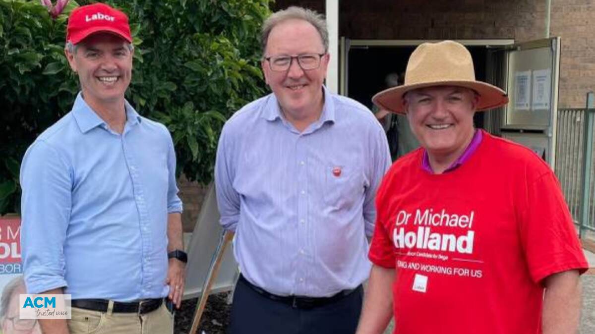 Labor candidate for Bega Michael Holland (centre) with supporters. Photo: Facebook