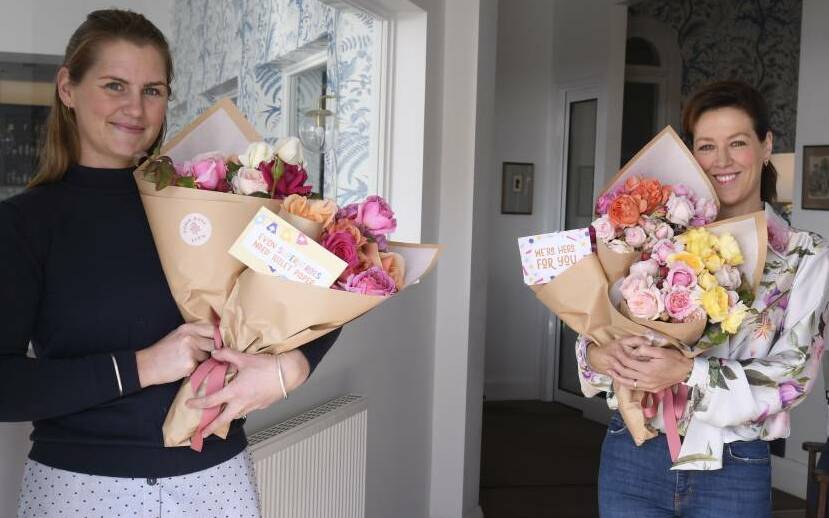 Soho Rose Farm owner Kristy Tippett and Provincial Hotel owner Gorgi Coghlan have worked together to offer free bouquets of roses as gifts to vulnerable people and health care workers in Ballarat. Picture: Lachlan Bence
