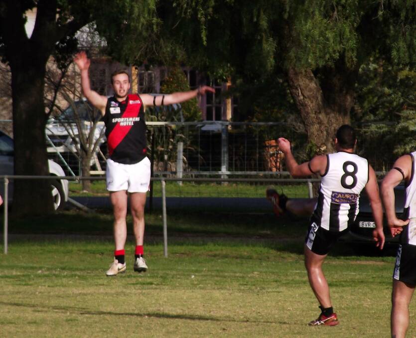 HAPPY DAYS: Magpies forward Andy Carey kicking one of eight goals in a game against Marrar in his first season at The Rock. 