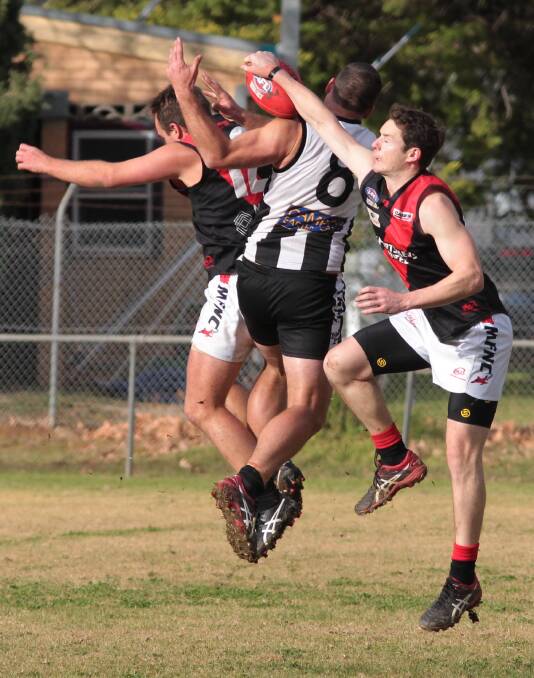 Carey is double-teamed by the Bombers in 2016, when he kicked five against Marrar. 