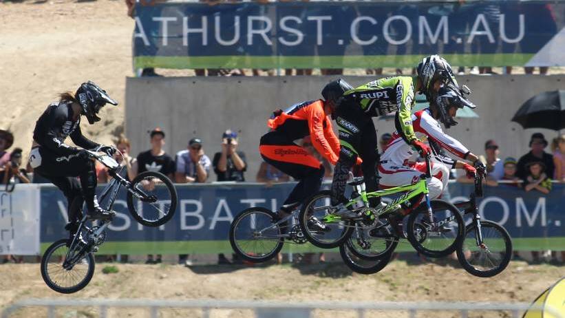 BMX: Racing at the track.