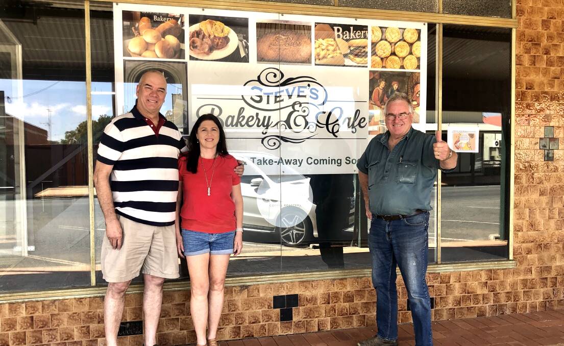 Steve and Leah Peters with Lockhart Shire mayor, Rodger Schirmer out the front of the new Lockhart bakery. 