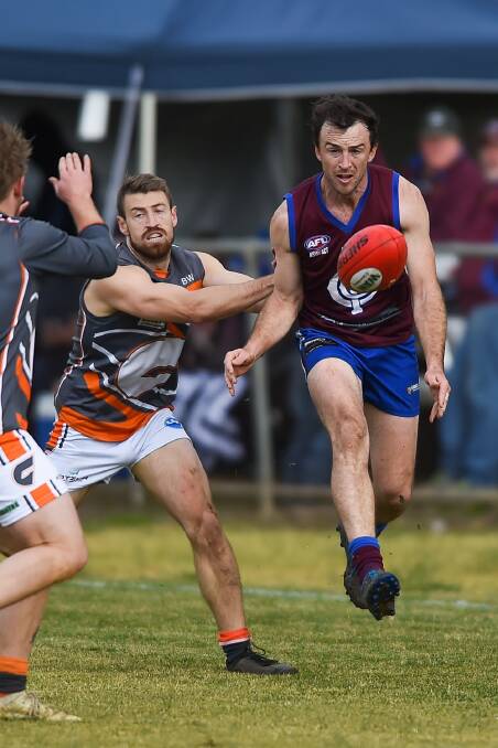 LION KINGS: Culcairn's Nate Stroh leads Sam Hargreave to the ball during the Lions' 36-point victory at Culcairn on Saturday. Pictures: Mark Jesser