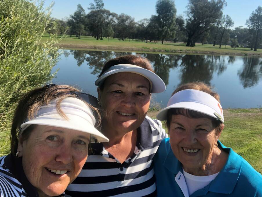 AUTUMN GLORY: Jane Yates, Linda Coombes and Marilyn Broughan admiring the lovely green golf course at Henty. Picture: Contributed