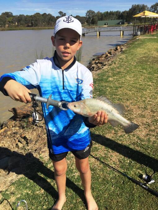SOLID DAY:Caleb Walker with a nice yella caught in Lake Albert. ​Send your pictures to craig@waggamarine.com.au or 0419 493 313.