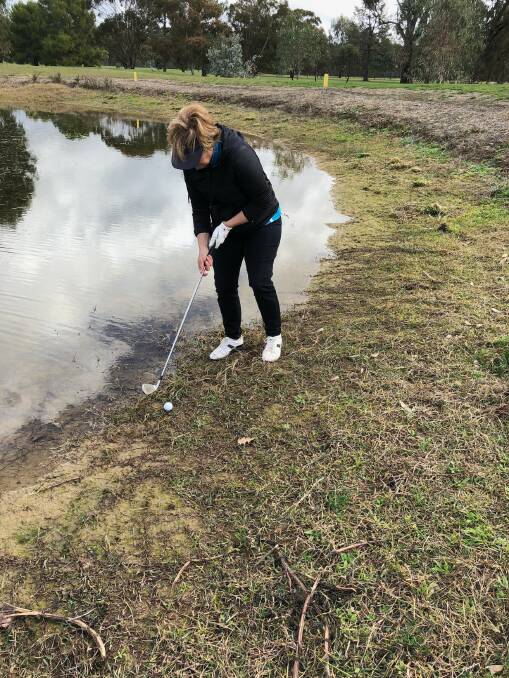 HENTY GOLF: Glenys Yates who just 'walked the ball on water'.