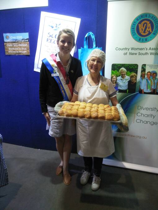 BAKE OFF: Stephanie Clancy, representing Walbundrie Show, and Lyn Jacobsen from Pleasant Hills CWA, doing the scones in the CWA Tea Rooms at the Sydney show.
